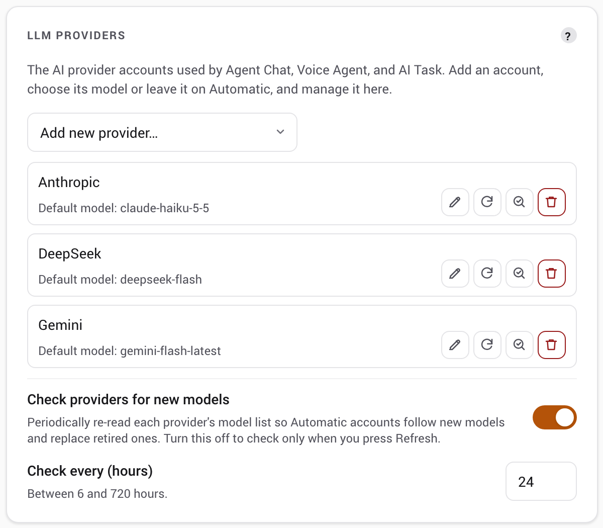 The LLM providers card in Settings with three provider accounts and their default models